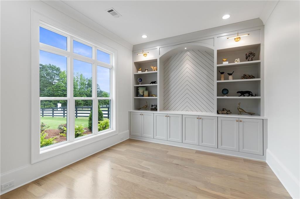 461 Harry McCarty Road Bethlehem, GA 30620 - Photo 5 of 78 a view of an empty room with a window