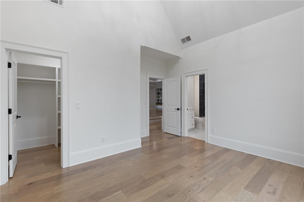 461 Harry McCarty Road Bethlehem, GA 30620 - Photo 56 of 78 a view of an empty room with wooden floor and closet