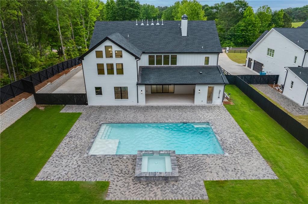 461 Harry McCarty Road Bethlehem, GA 30620 - Photo 73 of 78 a front view of a house with garden