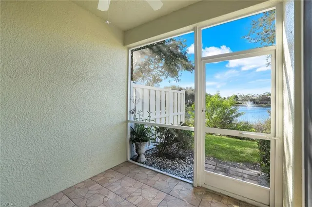 a view of a back yard from a room