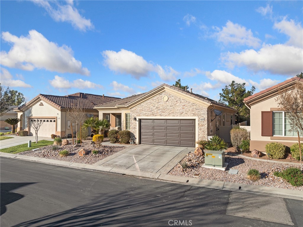 19330 Galloping Hill Road Apple Valley, CA 92308 - Photo 2 of 46 Front of home with beautiful Stone