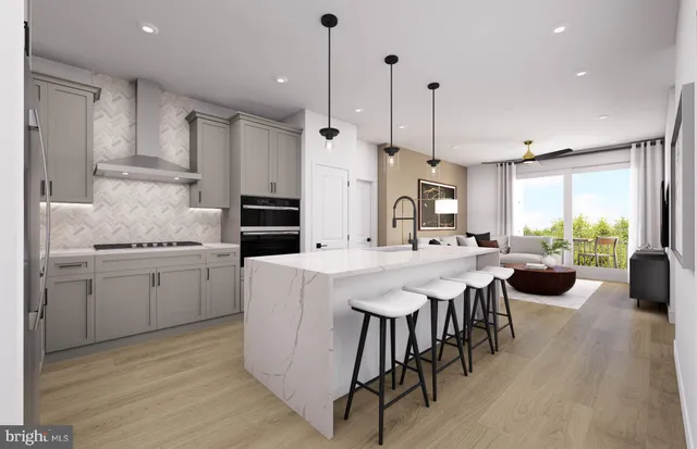 a kitchen with stainless steel appliances kitchen island a large island in the center