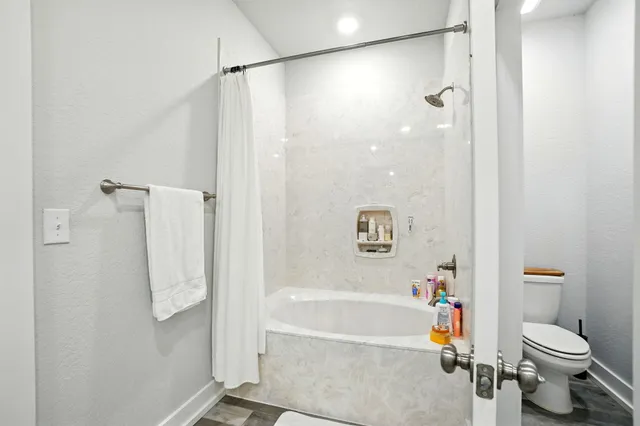 a bathroom with a sink and toilet