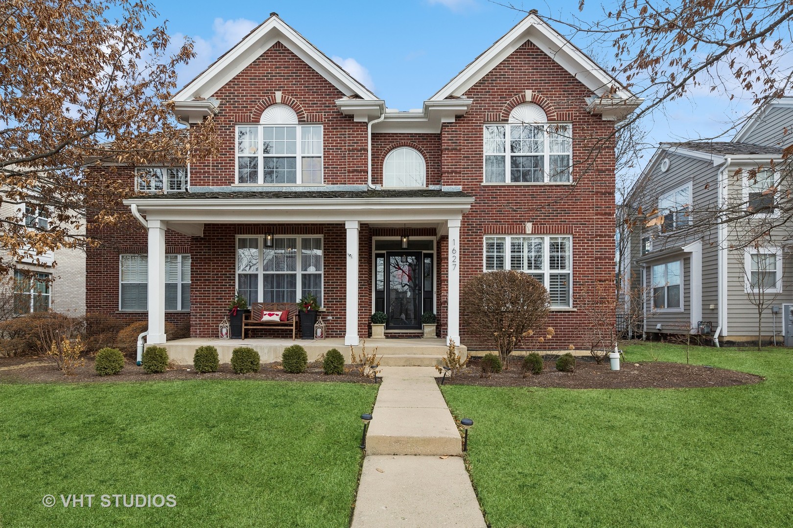 1627 Constitution Drive Glenview, IL 60026 - Photo 1 of 1 front view of a house with a yard