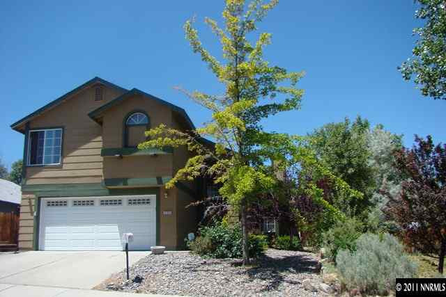 6369 Walnut Creek Road Reno, NV 89523 - Photo 1 of 1 a front view of a house with a yard