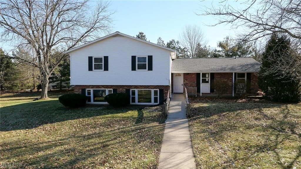 2749 Norton Road Stow, OH 44224 - Photo 1 of 24 Tri-level home with a front yard and brick siding