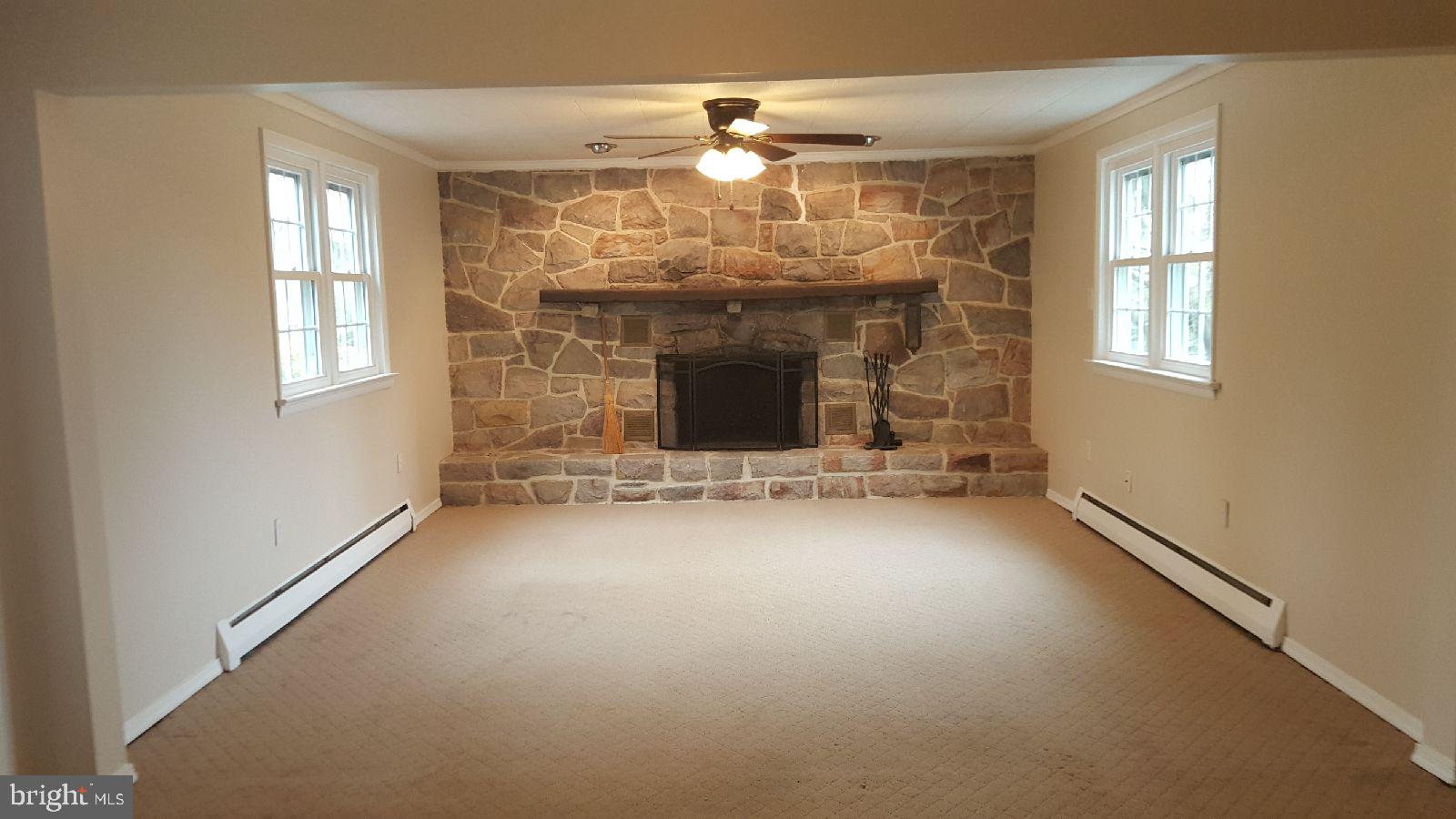 1513 Chestnut Hill Road Pottstown, PA 19465 - Photo 22 of 33 Family Room with Floor to Ceiling Fireplace