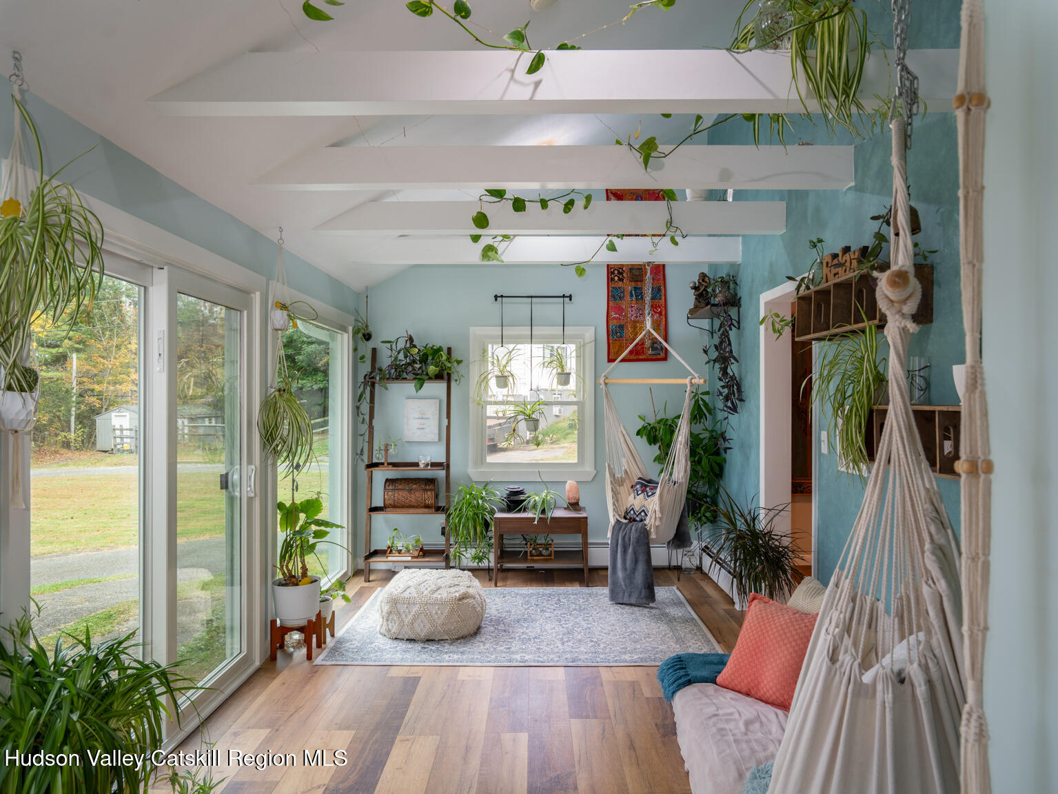 8 Creekside Road Hopewell Junction, NY 12533 - Photo 13 of 34 a living room with furniture and a potted plant