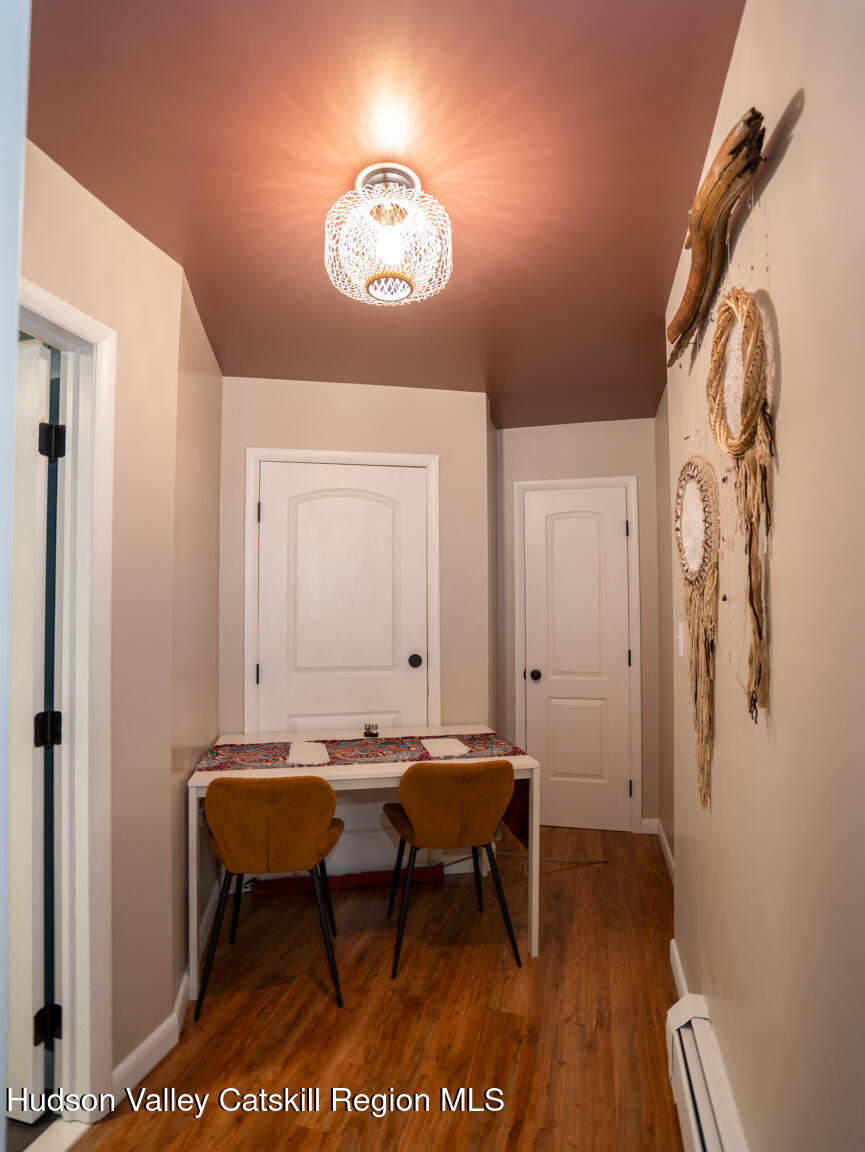 8 Creekside Road Hopewell Junction, NY 12533 - Photo 29 of 34 a view of a room with a table and chairs