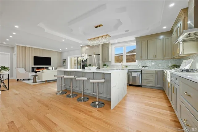 a kitchen with a sink cabinets and window