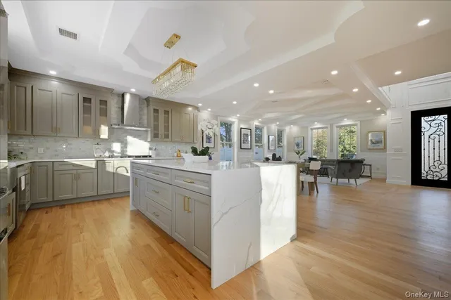 a kitchen with cabinets a sink and appliances