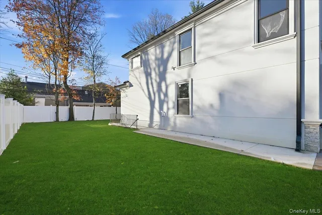 a view of a back yard of the house