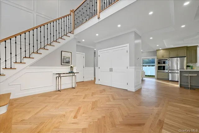 a view of kitchen with furniture and wooden floor