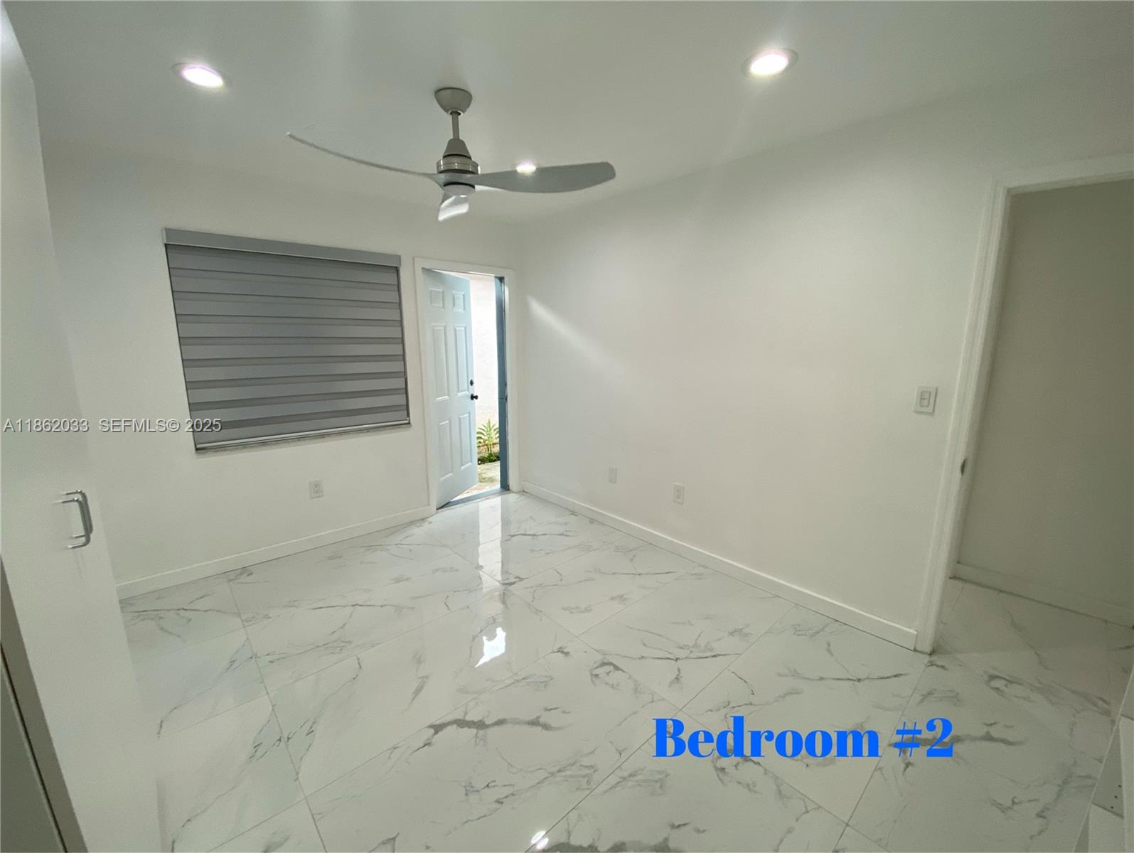 11564 Southwest 7th Street Sweetwater, FL 33174 - Photo 13 of 24 Bedroom #2 - with exit door