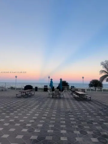 a view of car parked on road with sky view