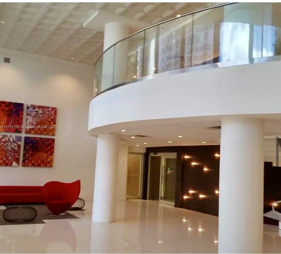 5701 Collins Avenue, Unit PH10 Miami Beach, FL 33140 - Photo 23 of 24 a living room with furniture