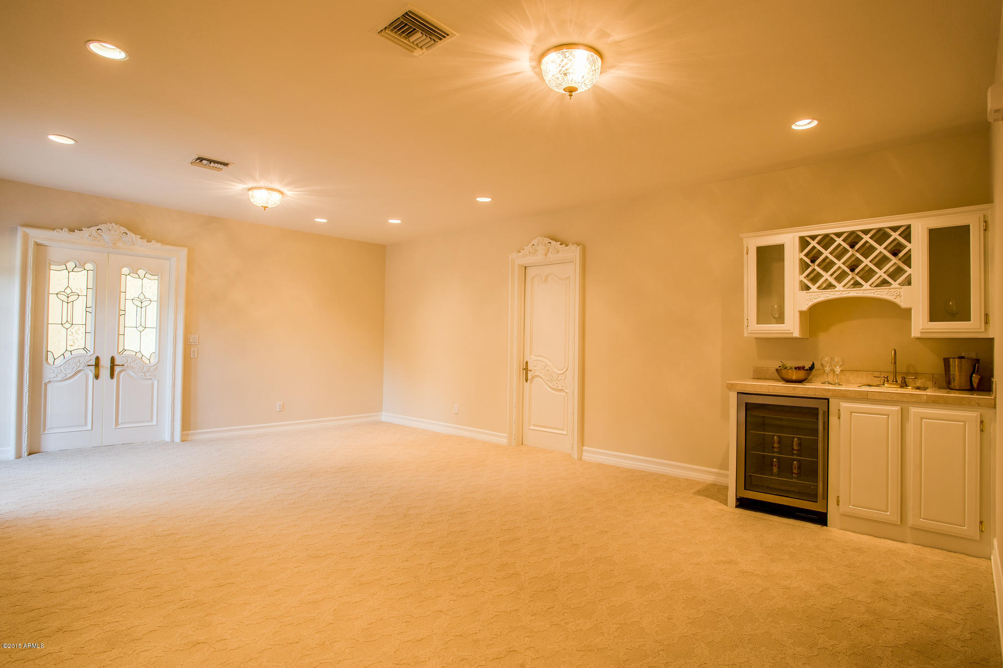 6431 East Cactus Wren Road Paradise Valley, AZ 85253 - Photo 21 of 54 master sitting room with wet bar