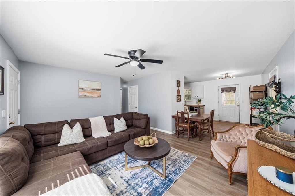 5638 Nacoochee Street Lula, GA 30554 - Photo 8 of 29 a living room with furniture and a table