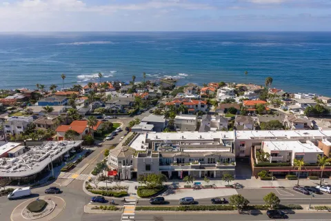 a view of building with an entryway and balcony