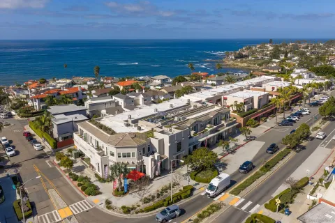 an aerial view of beach and ocean