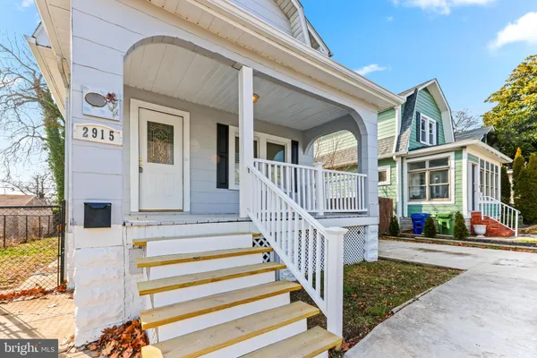 a view of a building with car parked