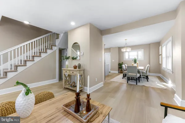 a living room with furniture and a table