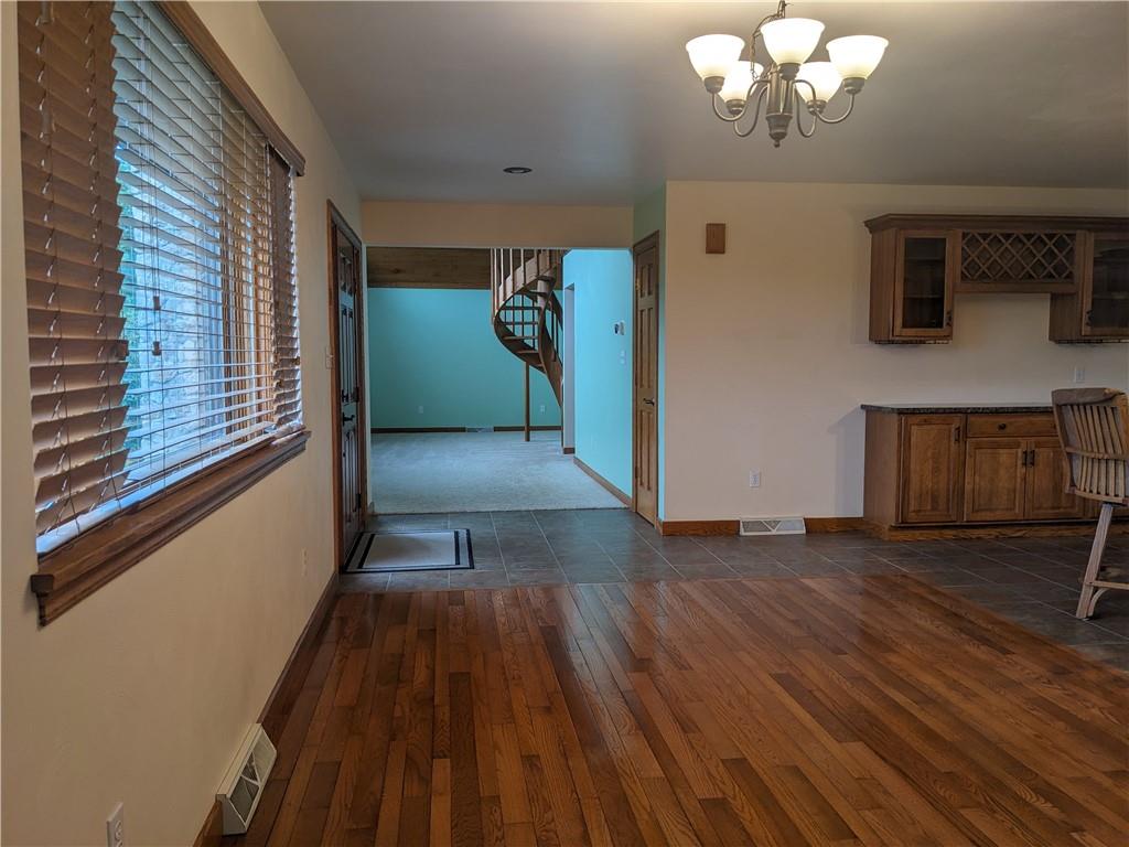 350 American Legion Road Latrobe, PA 15650 - Photo 11 of 45 a view of a livingroom with hardwood floor and a ceiling fan