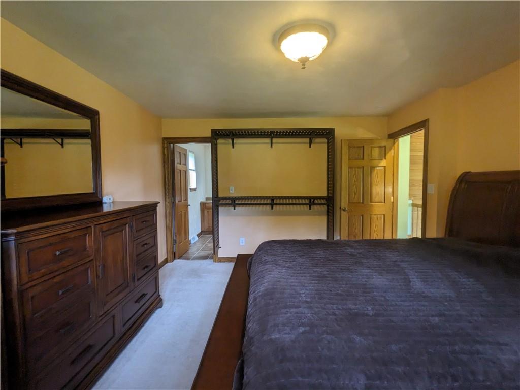 350 American Legion Road Latrobe, PA 15650 - Photo 13 of 45 a view of kitchen with granite countertop cabinets and flat screen tv