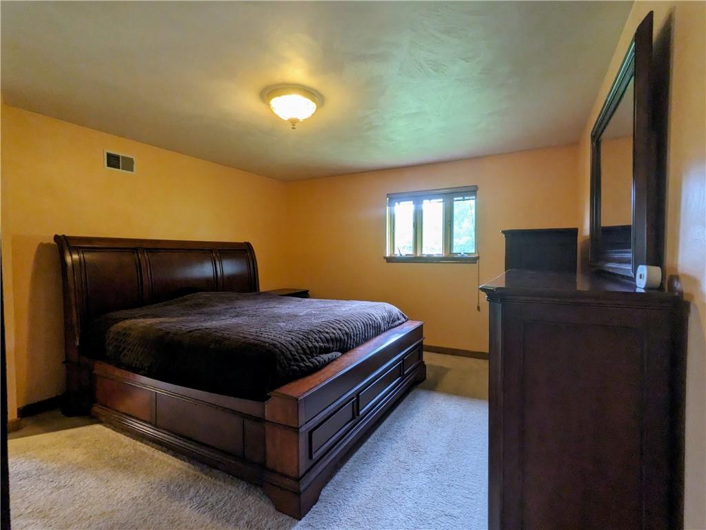 350 American Legion Road Latrobe, PA 15650 - Photo 14 of 45 a bedroom with a bed and window