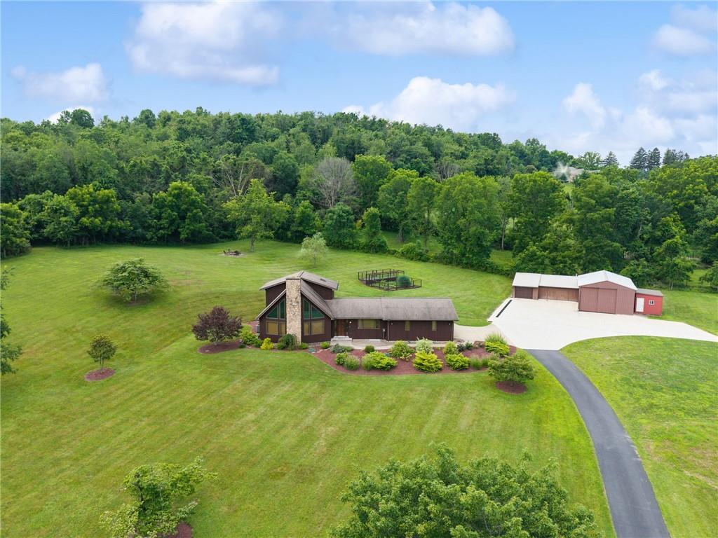350 American Legion Road Latrobe, PA 15650 - Photo 2 of 45 a aerial view of a house with swimming pool and garden