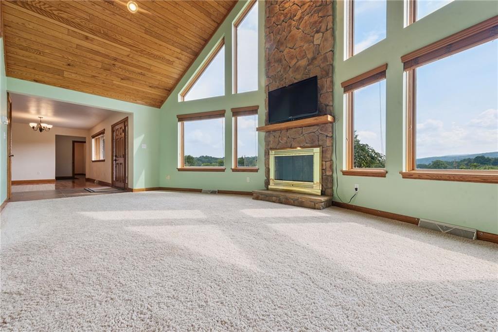 350 American Legion Road Latrobe, PA 15650 - Photo 7 of 45 a view of a livingroom with an empty space and a fireplace