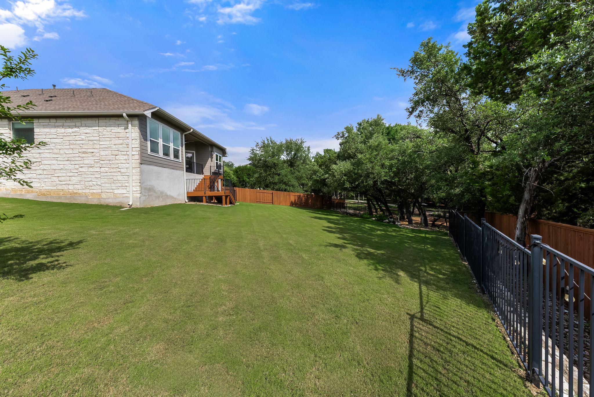 300 Prato Place Georgetown, TX 78628 - Photo 36 of 40 A deep backyard with a private fence offers ample space for outdoor enjoyment.