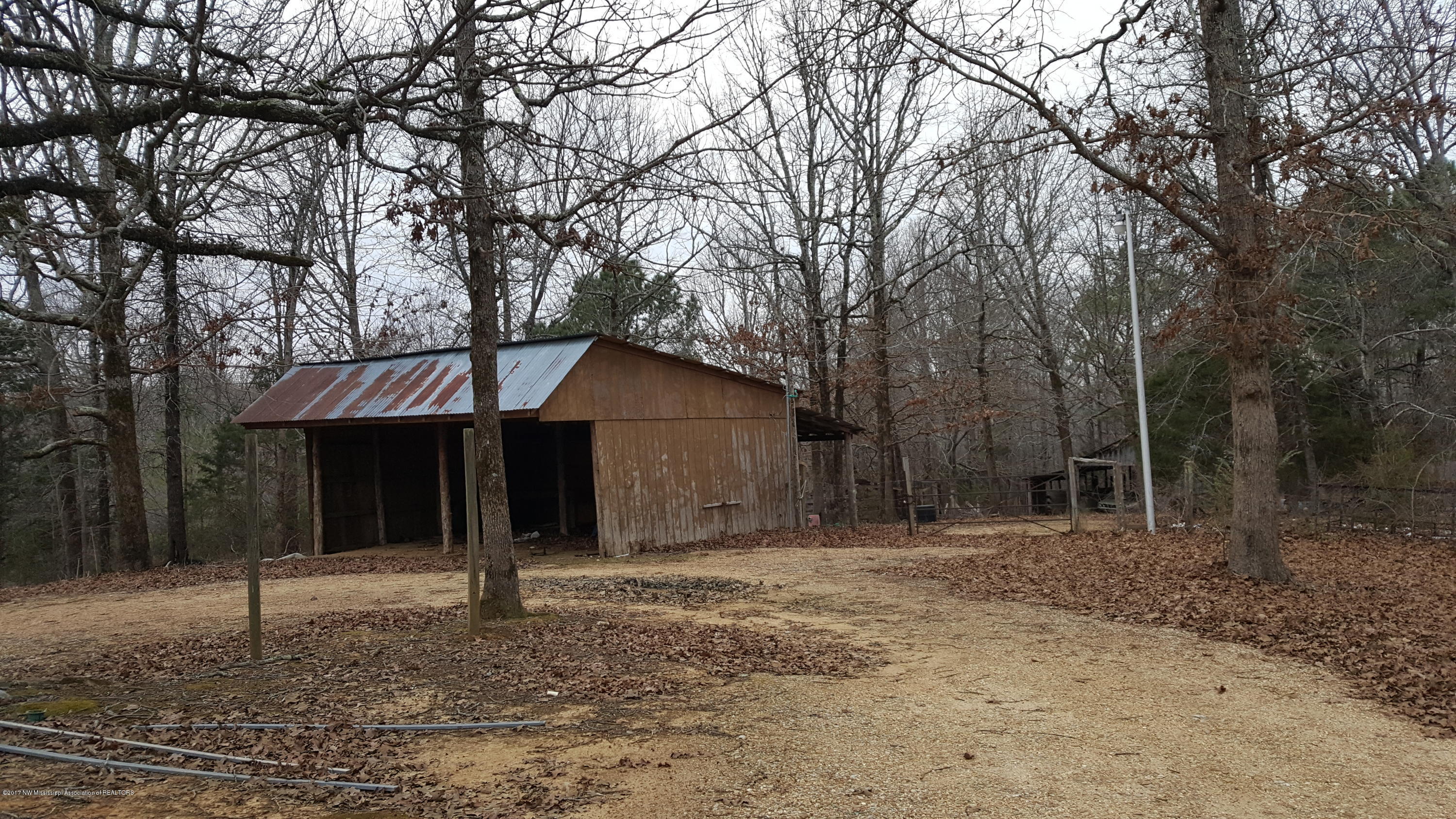 1035 Ales Road Batesville, MS 38606 - Photo 2 of 15 gate entrance to fenced property