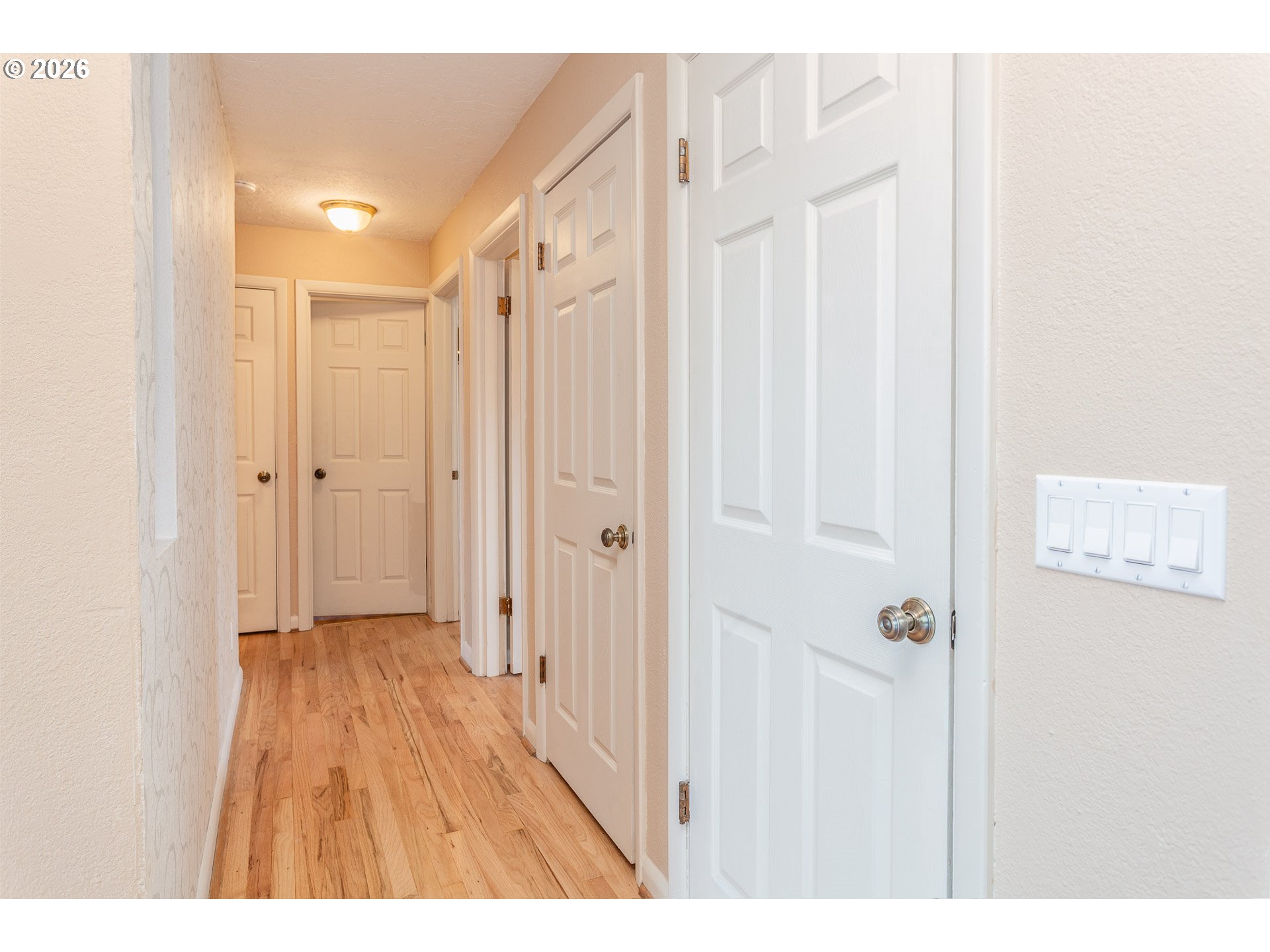 6805 Northeast Multnomah Street Portland, OR 97213 - Photo 14 of 44 a view of a hallway with wooden floor