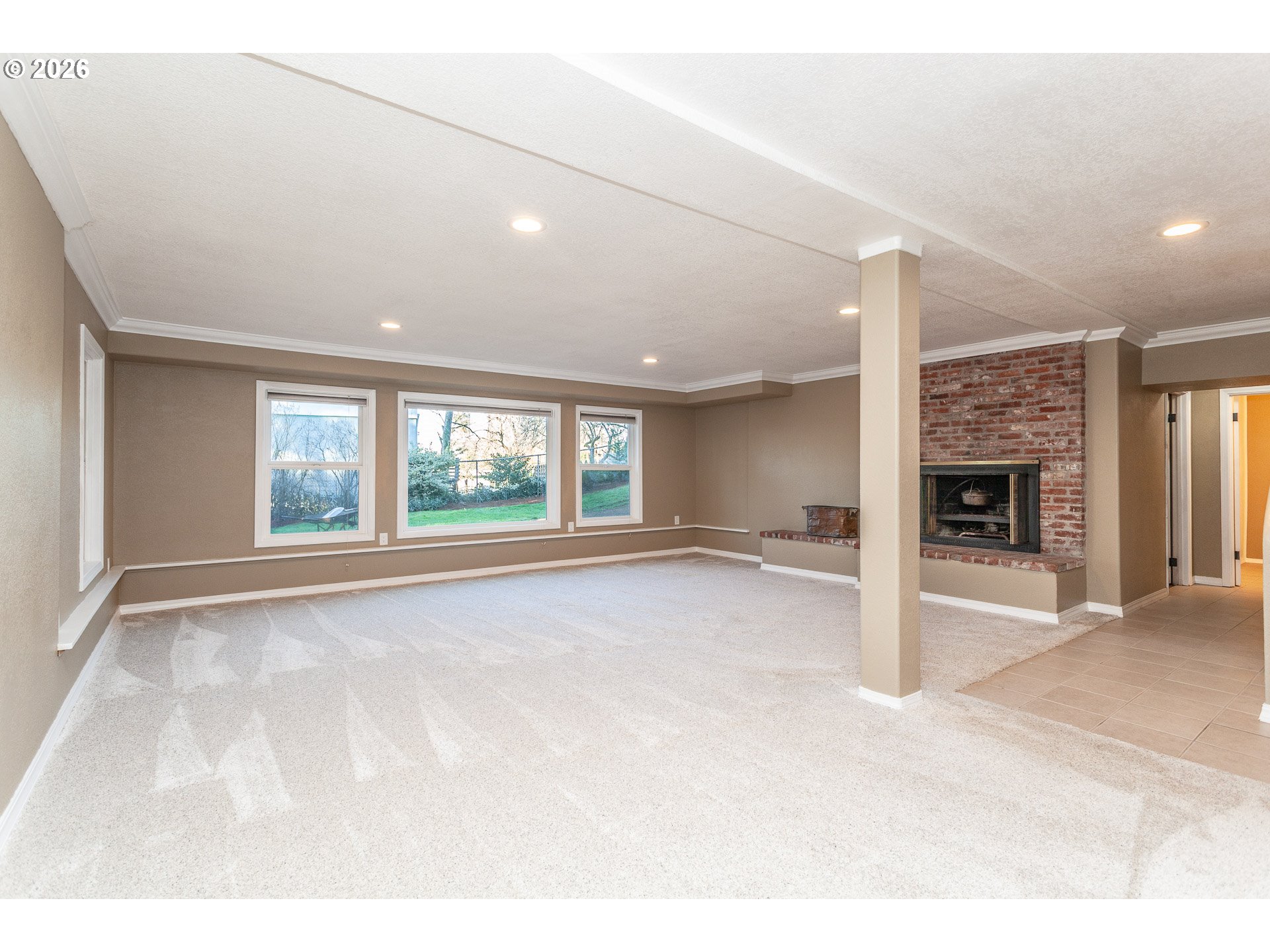 6805 Northeast Multnomah Street Portland, OR 97213 - Photo 29 of 44 a view of an empty room with a window