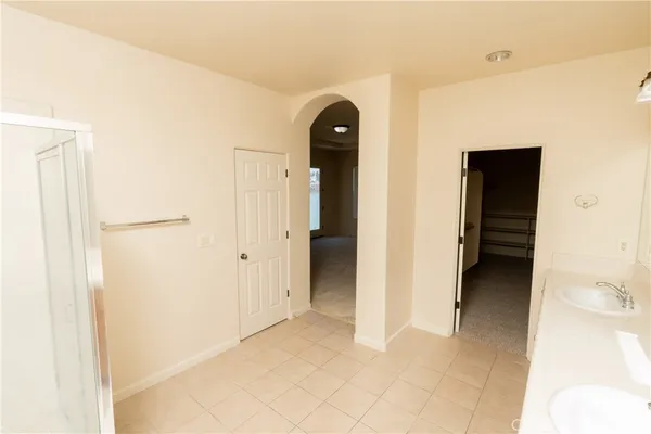 a view of a hallway with a porch