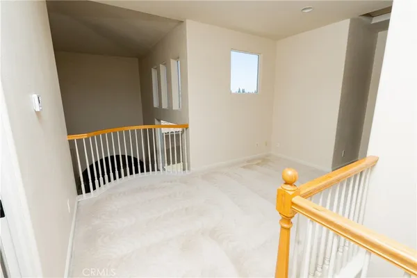 a view of small space with racks on the wall