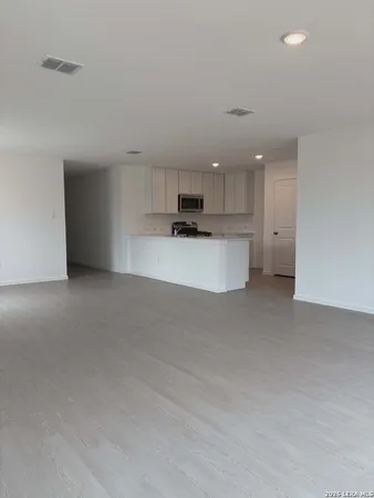 a view of a kitchen with a sink