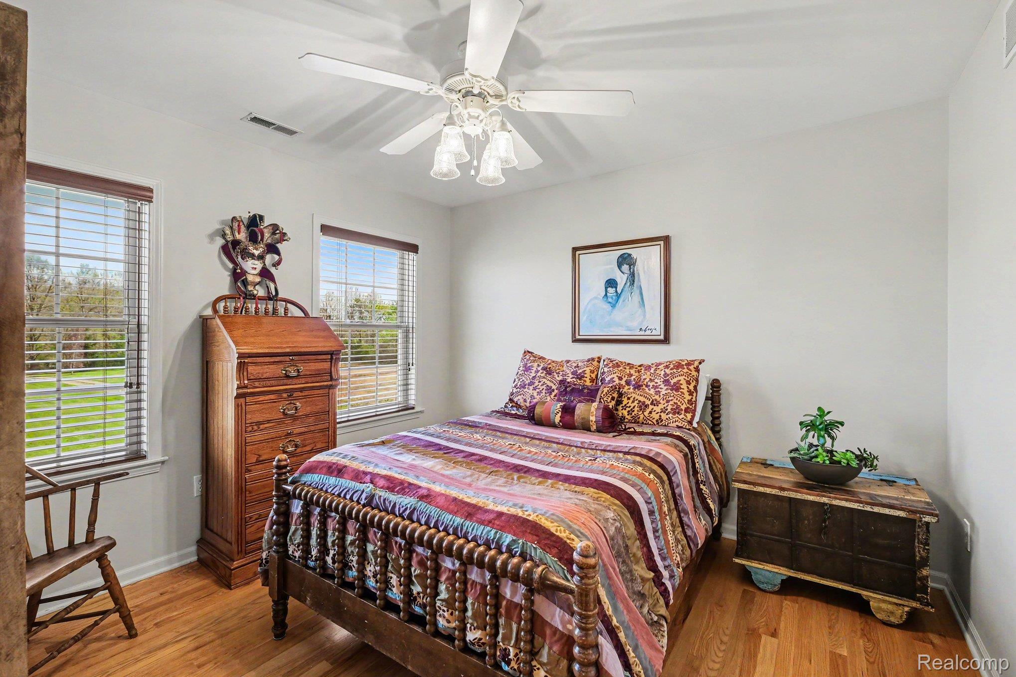 6520 Cook Road Swartz Creek, MI 48473 - Photo 27 of 43 Bedroom with light wood finished floors and ceiling fan