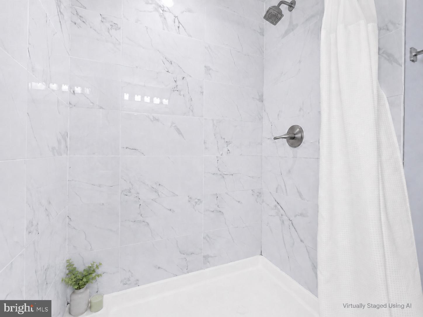 726 Nottingham Road Baltimore, MD 21229 - Photo 15 of 71 Sleek marble shower retreat.