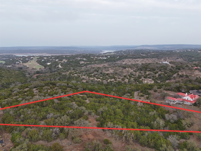 20114 Victoria Chase Leander, TX 78645 - Photo 7 of 14 Aerial view of property's location featuring property parcel outlined and a forest