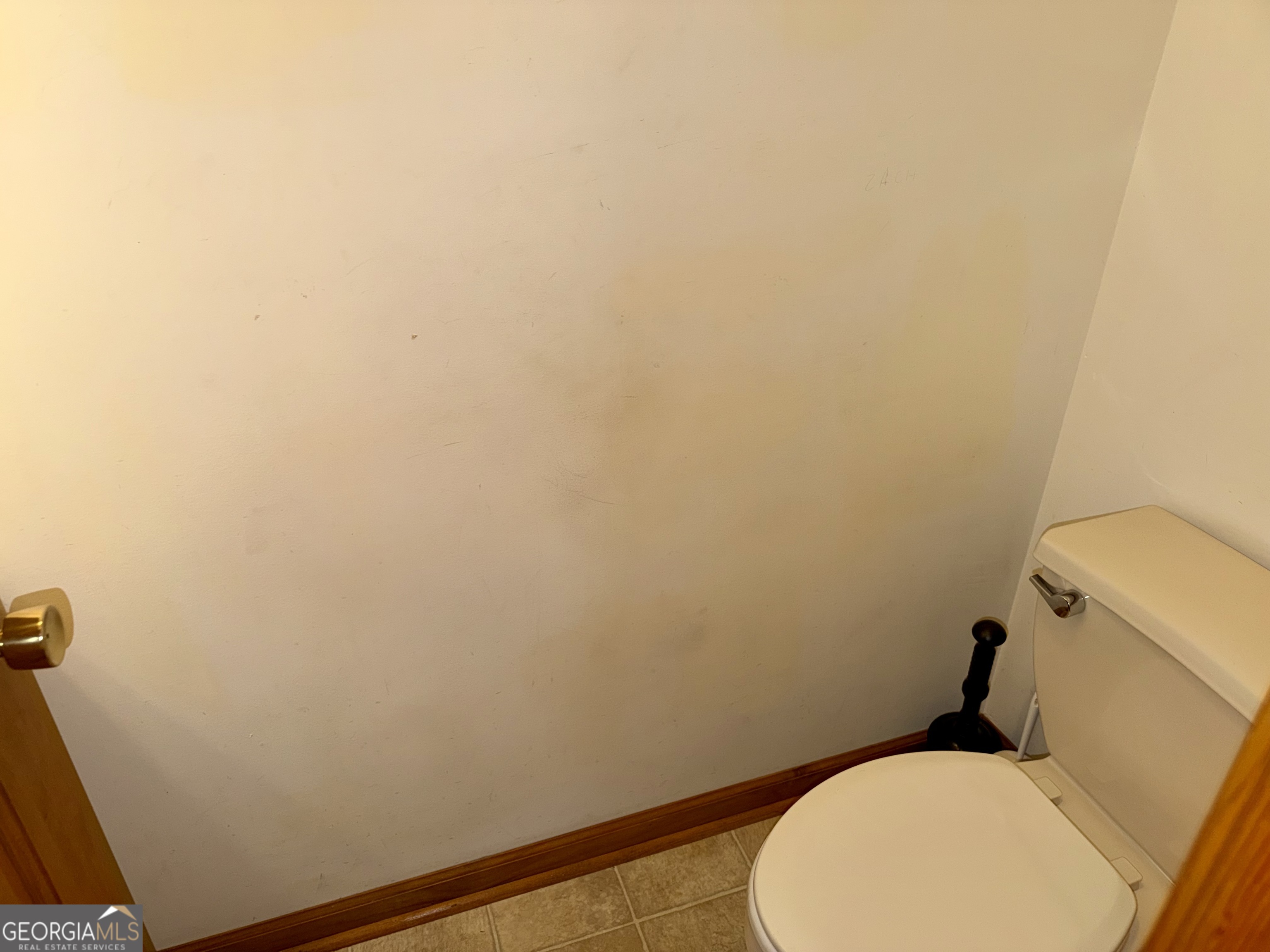 494 Broad Street Bowman, GA 30624 - Photo 27 of 65 a bathroom with a sink and a toilet