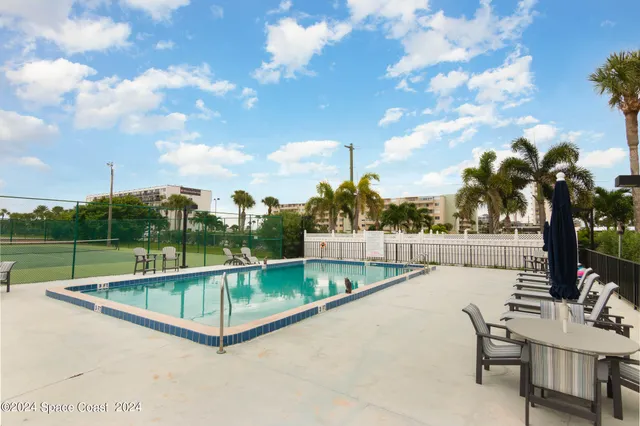 a view of outdoor space and swimming pool