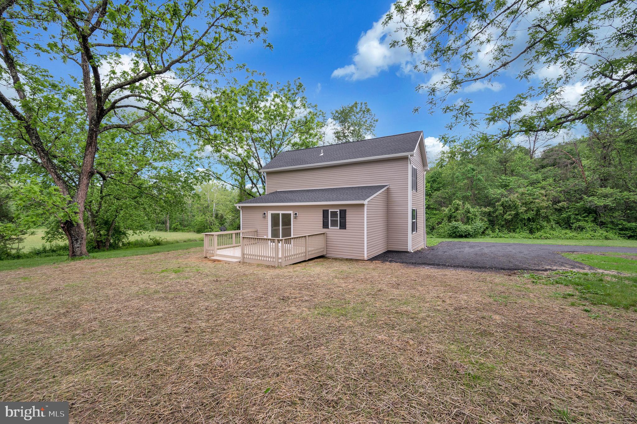 14169 Silver Hill Road Sumerduck, VA 22742 - Photo 38 of 40 a view of a house with a tree in the background