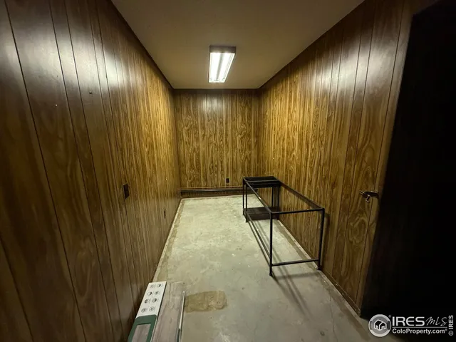 a bed room with a bed and a desk