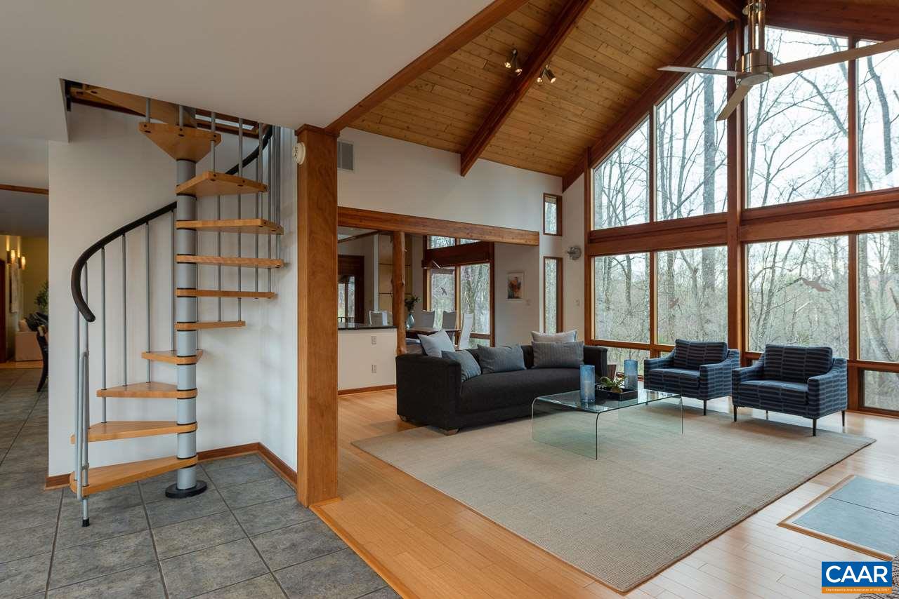 300 Turkey Ridge Road Charlottesville, VA 22903 - Photo 5 of 39 a living room with furniture and large windows