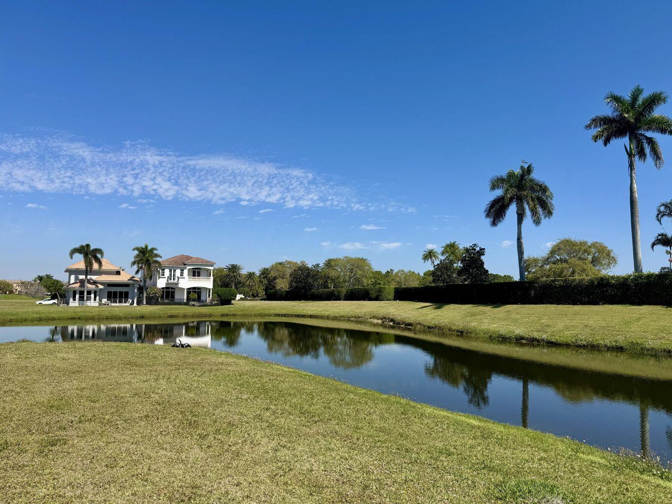118 Southeast Rio Palermo Port St. Lucie, FL 34984 - Photo 2 of 9 a view of residential houses with outdoor space and lake view