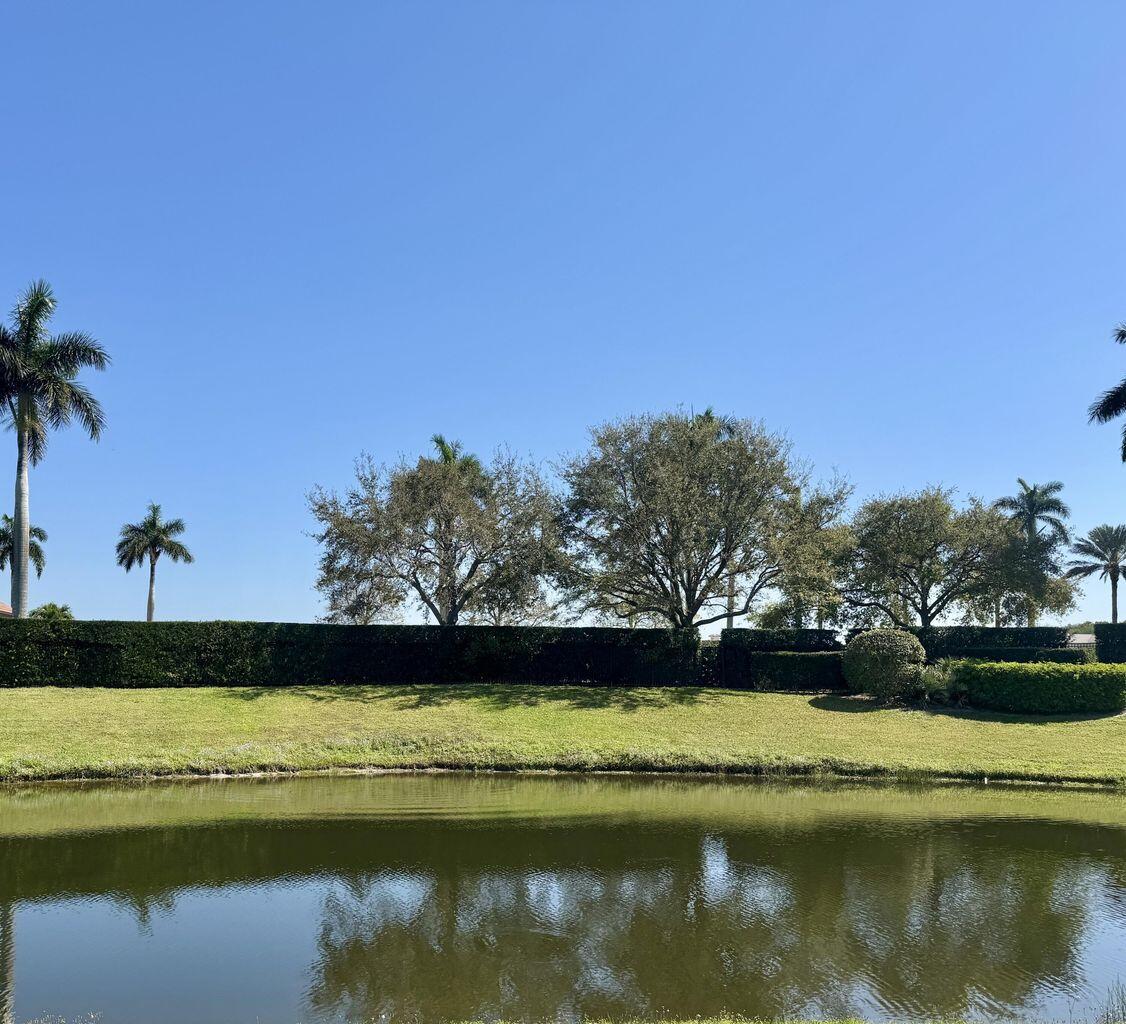 118 Southeast Rio Palermo Port St. Lucie, FL 34984 - Photo 3 of 9 a view of lake with green space