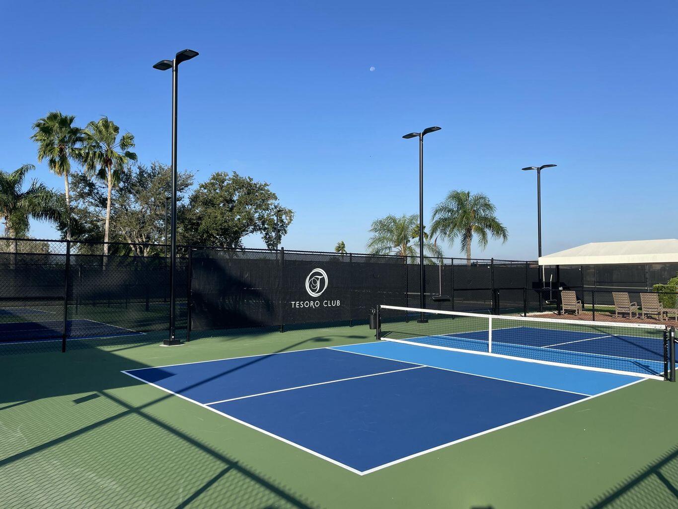 118 Southeast Rio Palermo Port St. Lucie, FL 34984 - Photo 8 of 9 a view of a tennis court