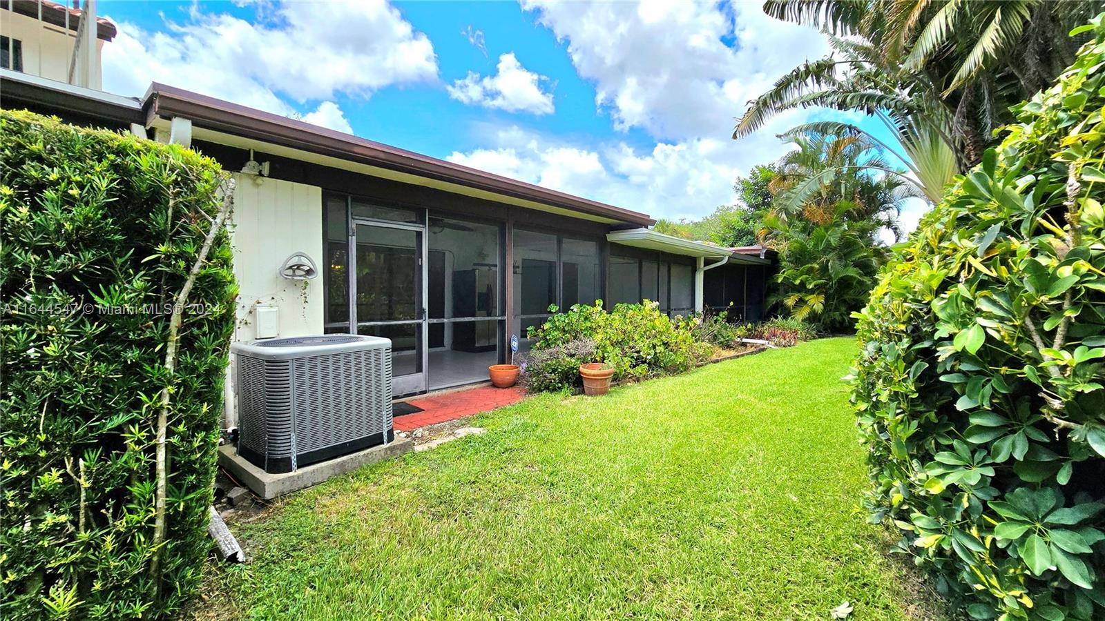 6727 Tiburon Circle Boca Raton, FL 33433 - Photo 7 of 36 a view of a house with backyard and porch